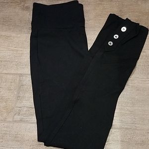 Womans black dress legging with button detail